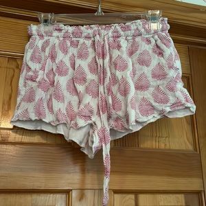 100% rayon shorts, white with pink floral pattern, size small, tie front